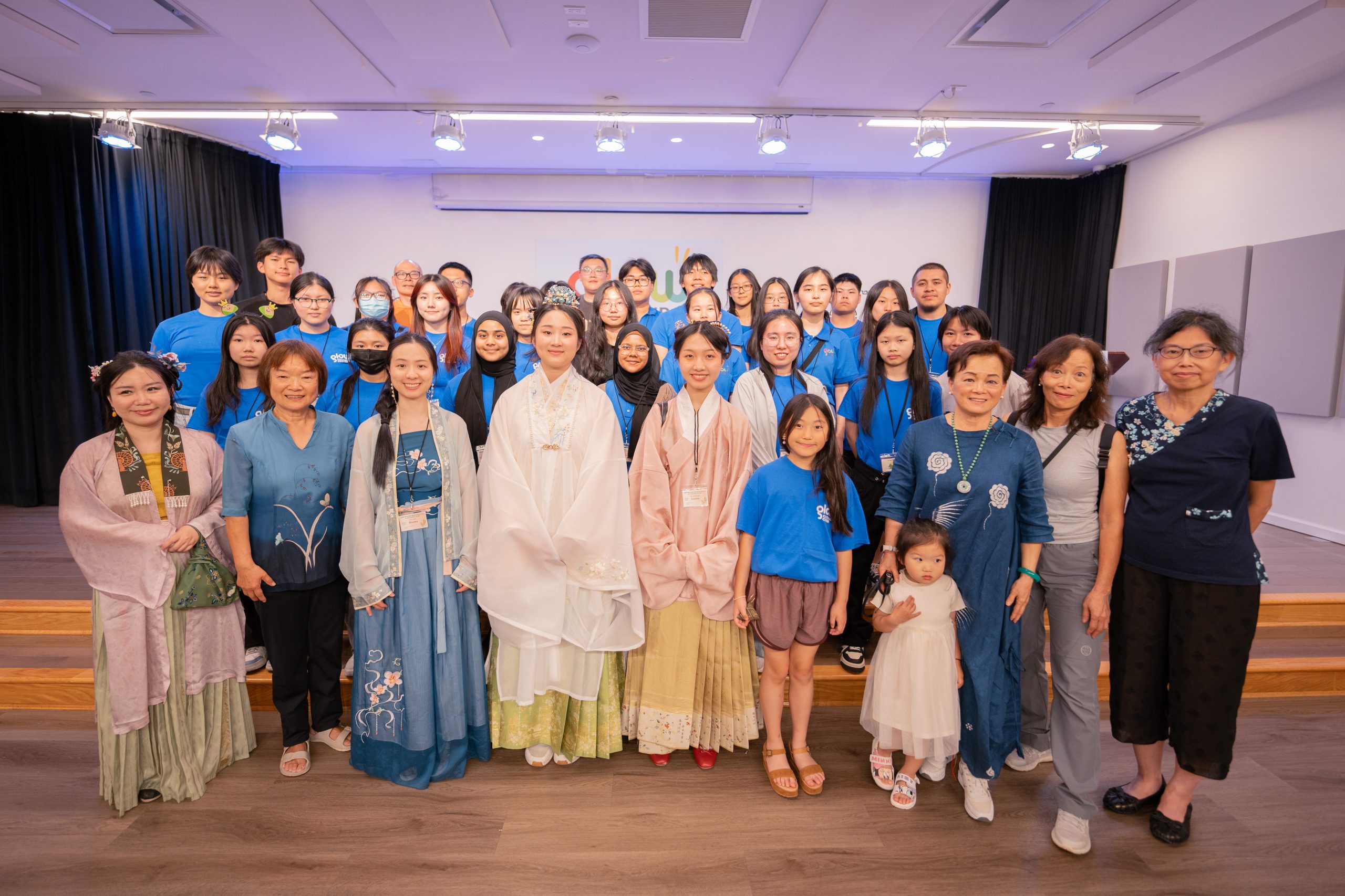 DBF volunteer group photo on stage